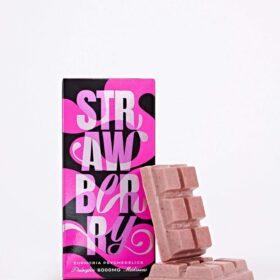 Euphoria Psychedelics Strawberry Swirl 6000mg packaging with a pink and black design, featuring a chocolate bar piece.