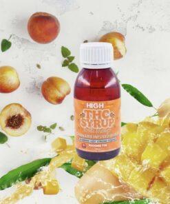 Bottle of Sky High Edibles THC syrup, Peach Mango flavour, 3000mg THC