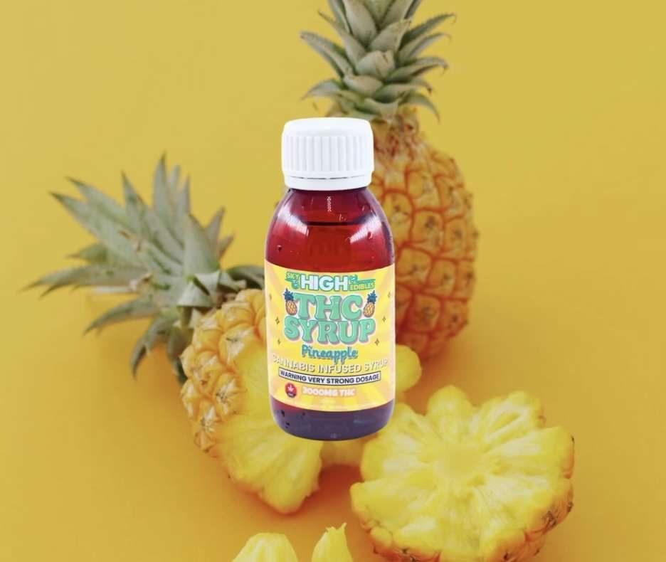 Bottle of Sky High Edibles THC syrup, Pineapple flavour, 3000mg THC